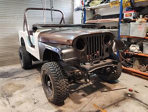 Click image for larger version. 

Name:	1979 CJ7 resto.jpg 
Views:	191 
Size:	256.6  
ID:	143406